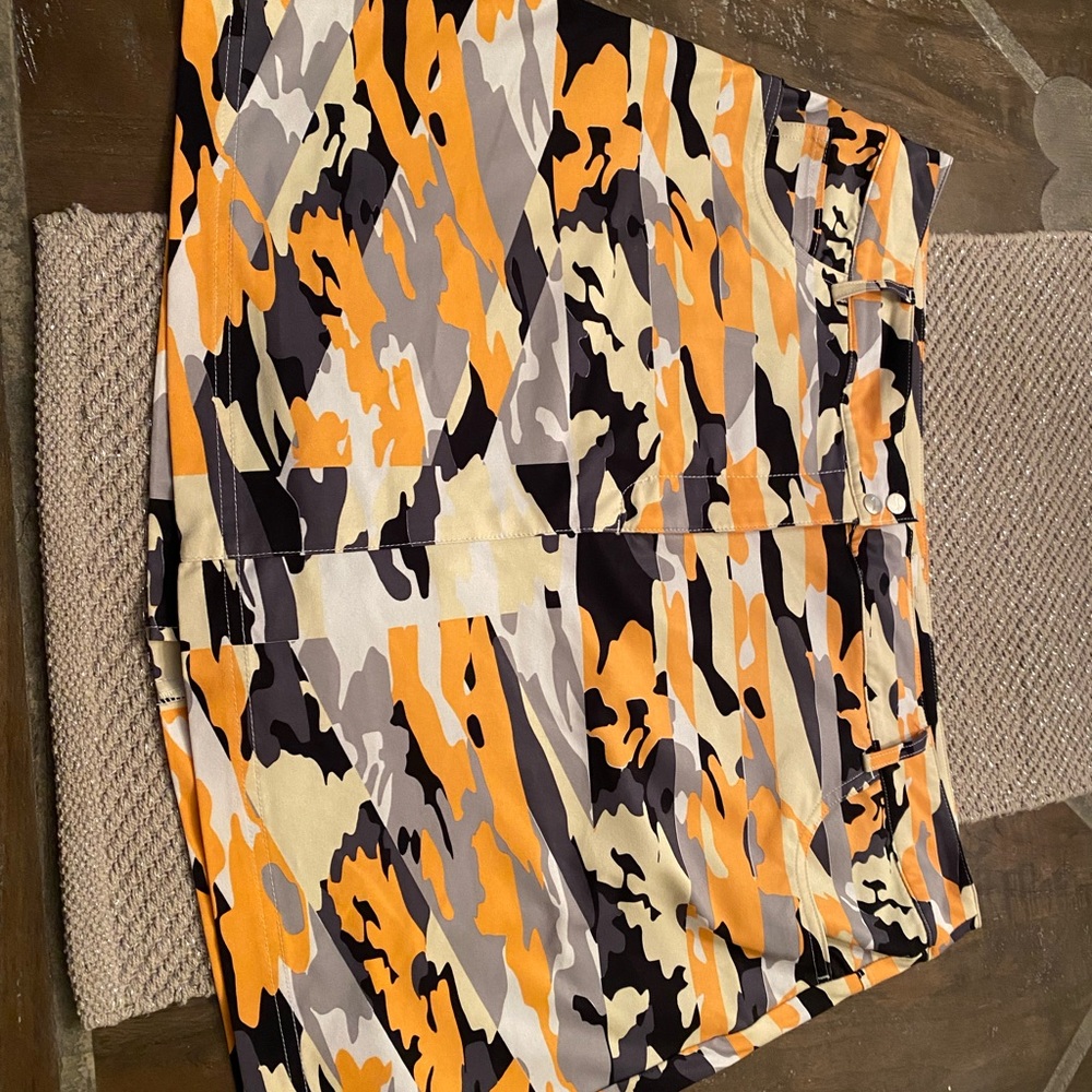 Camo-inspired skort in fun colors that’s ideal for golf or every day!